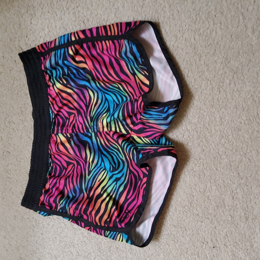 Rainbow Zebra printed shorts.